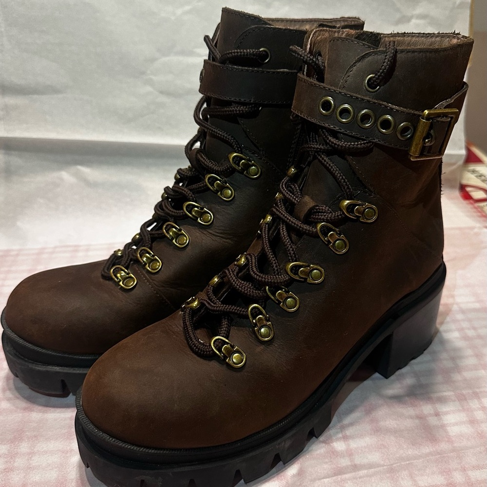 Jeffrey Campbell lace up boots.